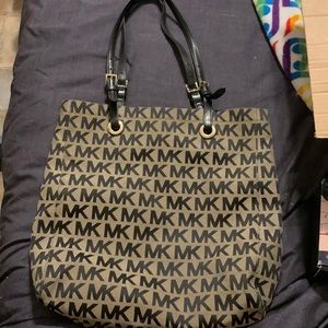 Michael Kors signature, black hand bag